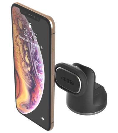 iOttie iTap 2 magnetic car mount attached to a car dashboard holding a smartphone
