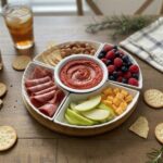 Set of 6 assorted elegant serving plates arranged with snacks and appetizers