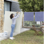 InnovaGoods Raclox wall mounted retractable clothes line with hangers in holes