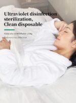 A folded 4-piece disposable bedding set in blue and green packaging