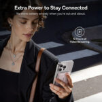 The pink Baseus PicoGo AM31 magnetic power bank attached to a phone using its built-in kickstand.