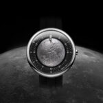 CIGA Design Moon Walker watch featuring a micro-engraved lunar surface dial and a miniature astronaut hand.