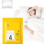 A folded 4-piece disposable bedding set in blue and green packaging