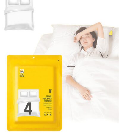 A folded 4-piece disposable bedding set in blue and green packaging