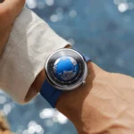 Blue Planet II Atlantic Ocean automatic watch with recycled titanium case and blue fluororubber strap.
