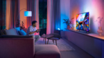 Philips Hue Play Gradient Lightstrip mounted on the back of a 75-inch television