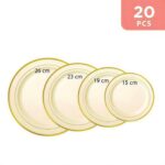 Stack of 20 white heavy-duty plastic plates with gold trim on a banquet table