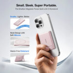 The pink Baseus PicoGo AM31 magnetic power bank attached to a phone using its built-in kickstand.