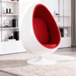 Modern upholstered fiberglass egg chair with tufted back for luxury interiors
