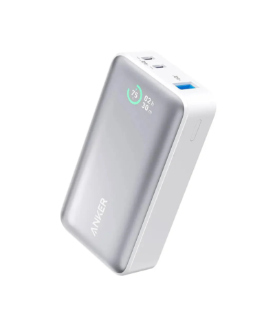 Anker 533 Powercore 10000mAh 30W PD power bank in white showing the LCD status display.