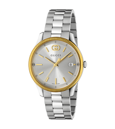 Front view of Gucci G-Timeless YA1264233 watch with silver dial and stainless steel bracelet.