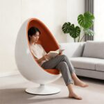 Modern upholstered fiberglass egg chair with tufted back for luxury interiors