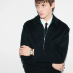 Front view of Gucci G-Timeless YA1264233 watch with silver dial and stainless steel bracelet.