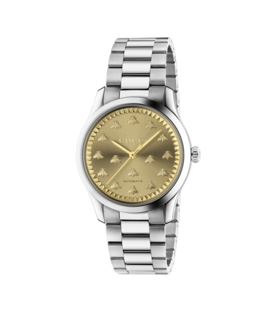 Gucci G-Timeless MultiBee watch with 38mm gold sunbrushed dial and steel bracelet.