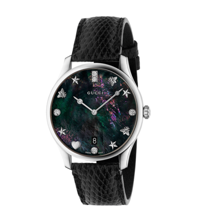 Gucci G-Timeless 36mm watch with Mother-of-Pearl dial and black leather strap.