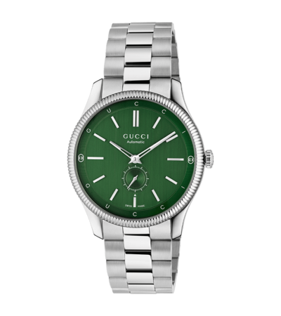 Gucci G-Timeless automatic watch with green dial and stainless steel bracelet