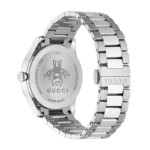 Gucci G-Timeless 38mm men's watch with black dial featuring bee and star motifs on a stainless steel bracelet.