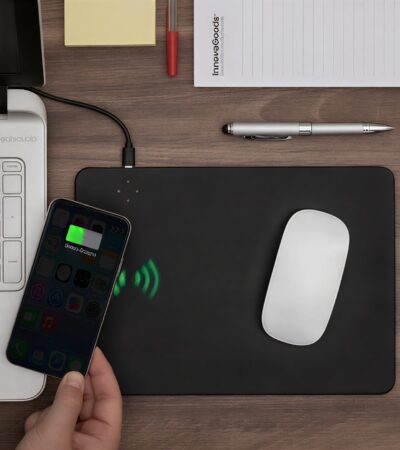 Black leather-style mouse mat with integrated wireless charging zone and smartphone