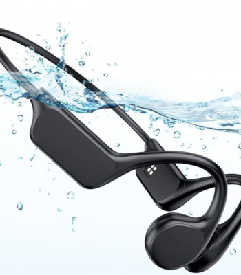Swimmer wearing black bone conduction headphones with goggles in a pool