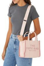 Light pink Marc Jacobs small jacquard tote bag with woven logo design