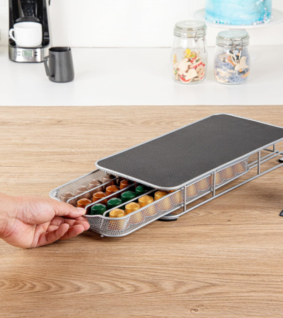 Black metal coffee capsule drawer holding 40 Nespresso pods