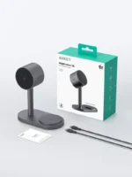 AUKEY Qi2.2 MagFusion 2-in-1 Magnetic Wireless Charger in Grey showing an iPhone and earbuds charging.