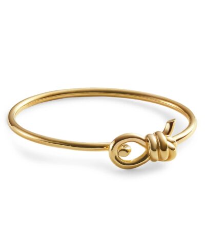 Close-up of the Bottega Veneta Knot Bracelet featuring the gold knot motif that is its signature.