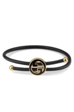 Gucci Interlocking G logo bracelet with black enamel and leather strap