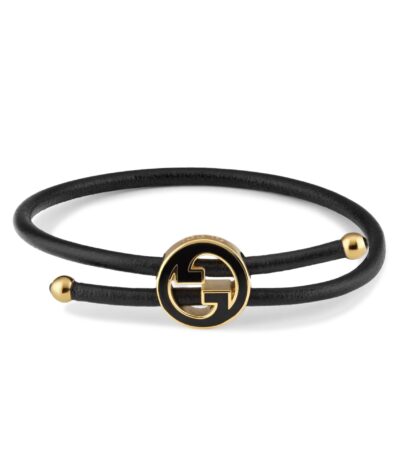 Gucci Interlocking G logo bracelet with black enamel and leather strap