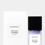 Minimalist 50mL bottle of Bohoboco Sea Salt Caramel Parfum featuring golden liquid.