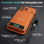 Vibrant orange BMX SolidSafe 10K magnetic power bank with built-in lanyard and LCD screen