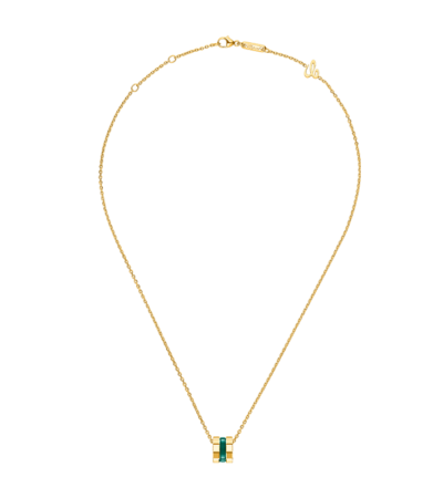 Front view of a geometric yellow gold pendant with green HyCeram inlay on a gold chain.